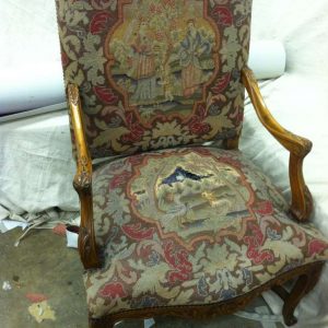old ripped armchair