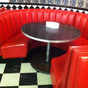 red round booth with round table